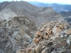 John climbing the Class 4 west side of the WCP-5 summit block.