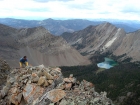 Just a few moves below the summit of WCP-5, Swimm Lake in the background.