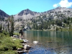 Jordan fishing at Hummock Lake, Windy Devil Pass on the left.