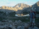 Dave at the 10k tarn, Serrate Ridge and Castle Peak in the background.