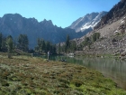 Jordan fishing at Shallow Lake, Serrate Ridge in the background.