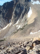 Rick climbing the south face of Merriam Peak.