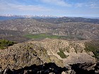 Watson Peak summit view, looking west toward the Sawtooths. The Meadows area below.