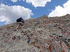 Climbing the buttress in full packs.