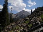 Peak 10848' stands at the northern end of the Chinese Wall. This is a shot taken from the trail about half way between Slate Creek and Hoodoo Lake.