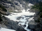 Ken about to cross a snow bridge as we near Frazier Lake.