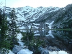 Evening view of Little Frazier Lake, still lots of snow in July.