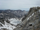 The partially frozen Glacier Lake sits below and to the east of the Eagle Cap.