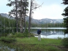 Kris taking a photo at Horseshoe Lake during the hike out.