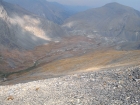 Looking down on the 10000' basin with Octoberfest Peak in the background to the right. The notch in the center leads to the Wet Creek drainage.