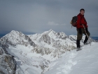 Me on the summit, with Mount Idaho and Mount Borah in the background.