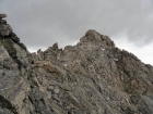 Chris contemplating Mount Helen's class 4 ridge.