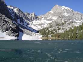 Mount Idaho behind a partially frozen Merriam Lake.