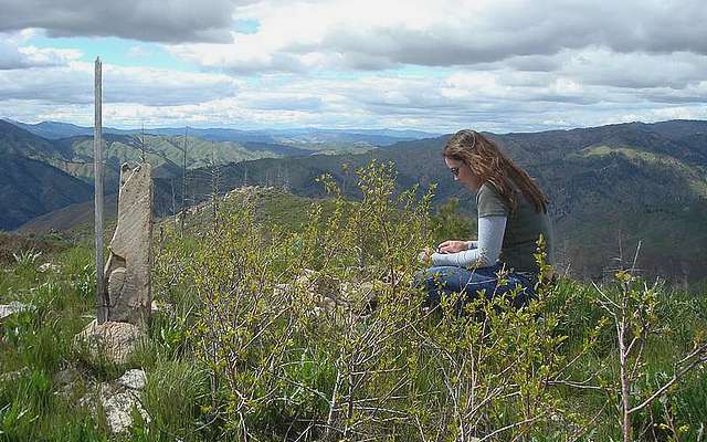 Checking out the summit register on Grape Mountain