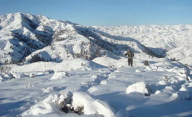 Matt snowshoeing towards Hutton Peak.