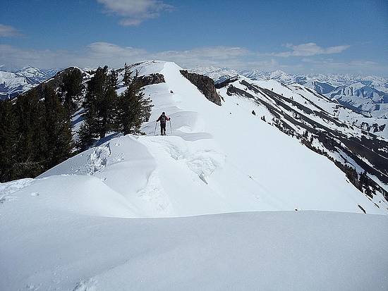 John crossing cornices on the northeast ridge of Kelly Mountain.