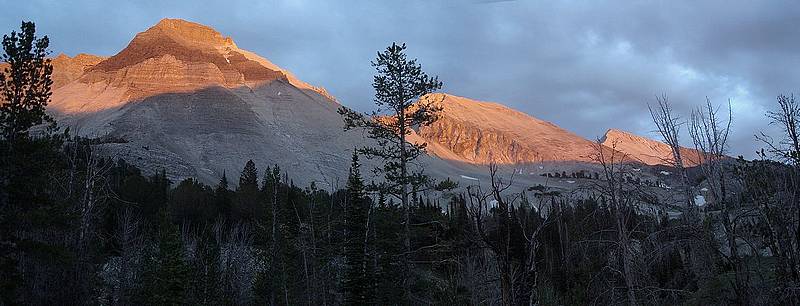 Sunset on Caulkens Peak, WCP-9, and David O Lee Peak from Ocalkens Lake.